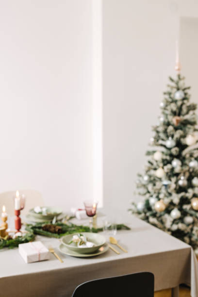 istock New Year's Eve Preparations: Elegant Christmas Table Setting at Home. Defocused shot 1356441056