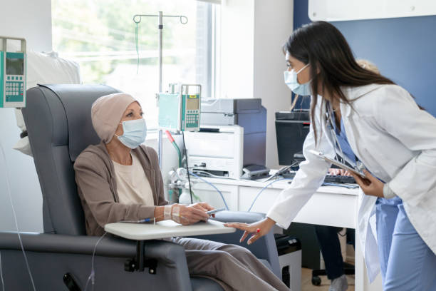 istock Doctor Checking in on Cancer Treatment 1356442514