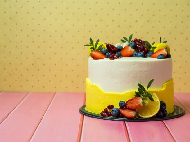 istock beautiful birthday cake decorated with berries with place for text 1356444977