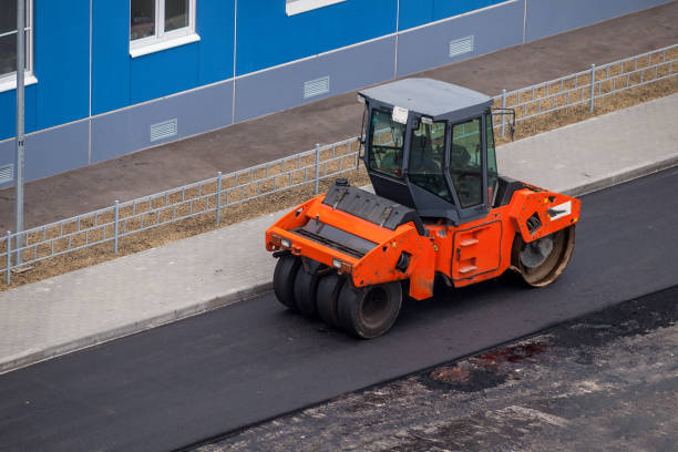 istock Roller machine designed for layer-by-layer compaction of loose, loosely connected and connected soils and bases in the construction of embankments, dam 1356445805