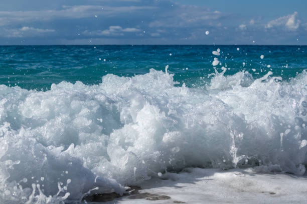 istock Waves splash with blue sea, Lefkada island, Greece 1356448425