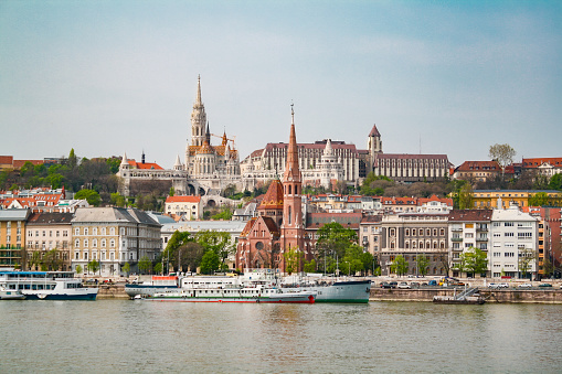 Riverbank of Budapest, Hungary, showing the Matthias Church, Fisherman's Bastion and Szilágyi Dezső Square Reformed Church. Taken in the Spring of 2019.