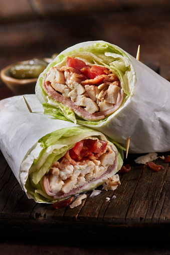 Roast Chicken BLT Lettuce Wrap Sandwich with Black forest Ham, Bacon, Lettuce, Tomato and Mayo