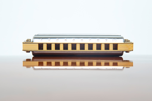 Closeup of a harmonica on a table