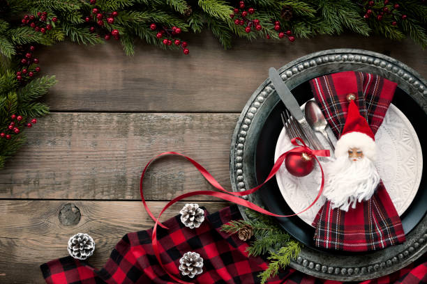 istock Holiday Christmas Dining Plate on an Old Wood Table 1356456219