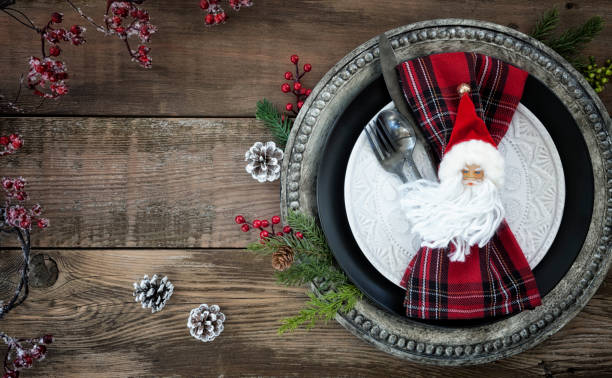 istock Holiday Christmas Dining Plate on an Old Wood Table 1356456750
