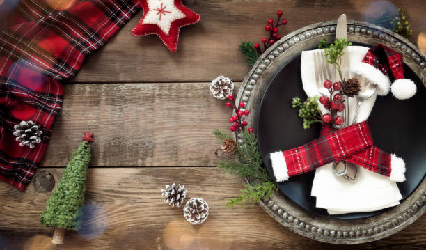 istock Holiday Christmas Dining Plate on an Old Wood Table 1356456961