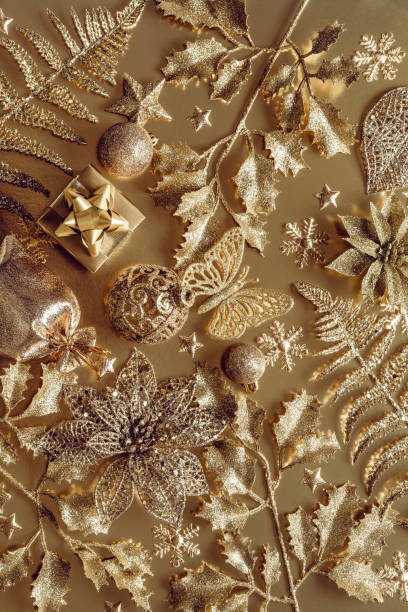 istock Golden abstract christmas background with christmas decorations 1356457849