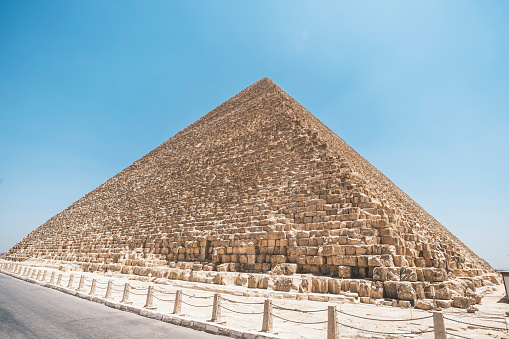 The great pyramid of Cheops in Cairo, Egypt. Pyramids of Khafra against the blue sky.