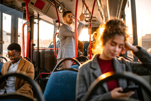 istock Young businessman traveling by bus 1356465083