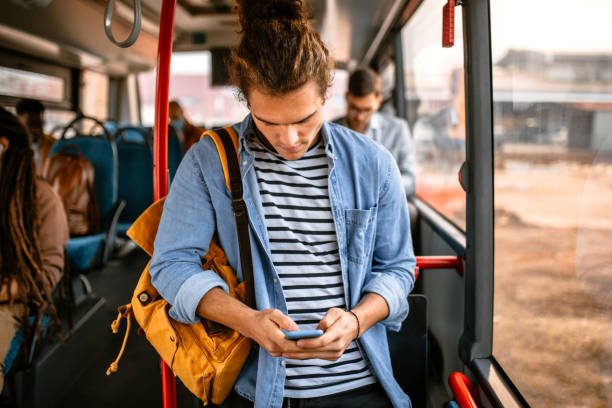 young tourist riding in bus - bus riding public transportation businessman imagens e fotografias de stock