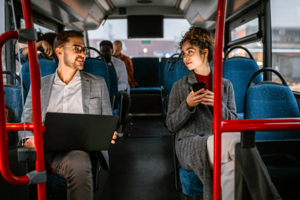 istock Friends travel by bus after work 1356465225