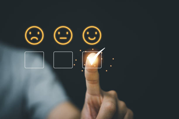 istock Businessman touch virtual touch screen, select smiley face emotion button for best evaluation. Customer Satisfaction Concept 1356465307