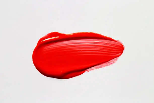 Red Acrylic Paint Spread In White Background