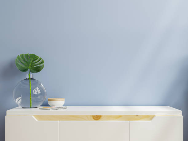 istock Cabinet mockup in modern empty room,blue wall. 1356484255