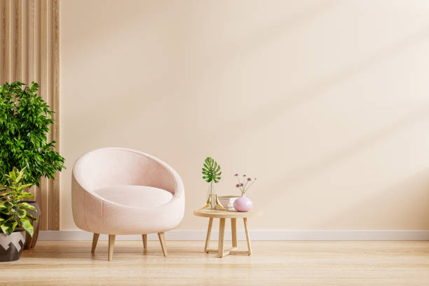istock Modern interior with an armchair on empty cream color wall background. 1356484328