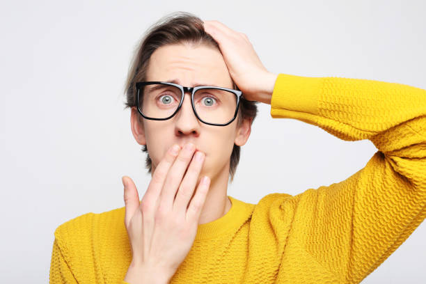 istock Astonished young crazy man feels stress 1356484391