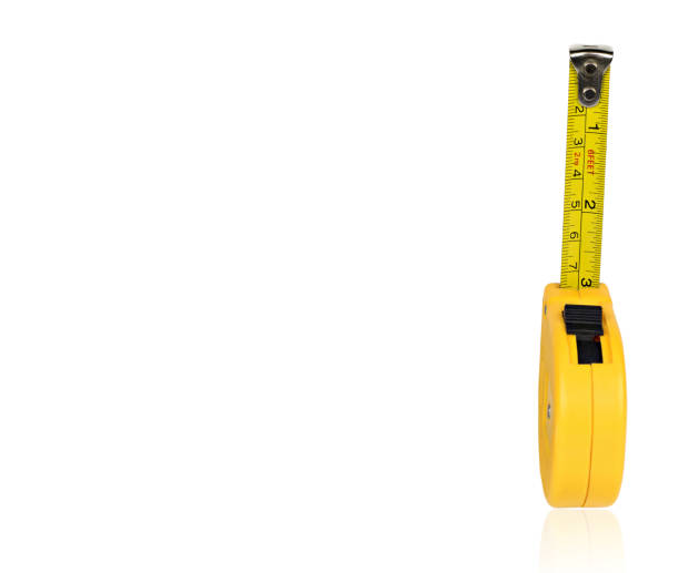 istock Tape measure isolated on white background. 1356487457