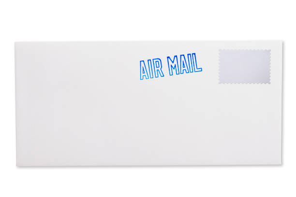 isolated shot of white air mail envelope with blank postage stamp on white background - air mail mail envelope blank imagens e fotografias de stock