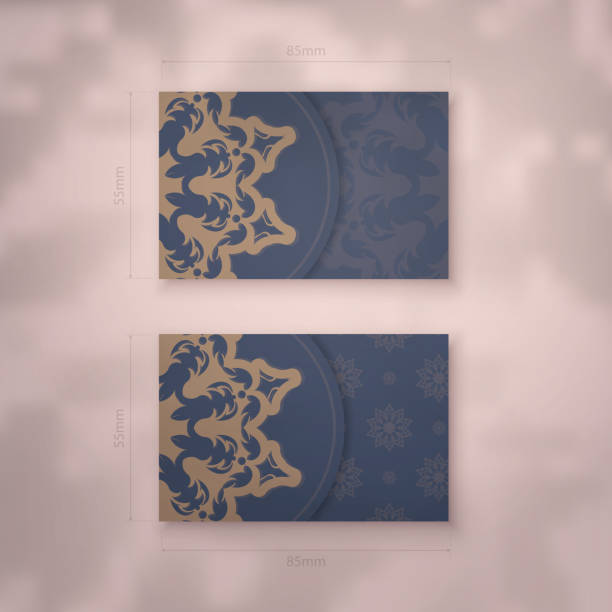 istock Business card in blue with a luxurious brown pattern for your business. 1356496568