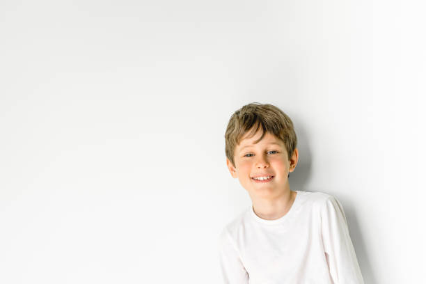 istock Portrait of joyful 8 year old boy 1356497254