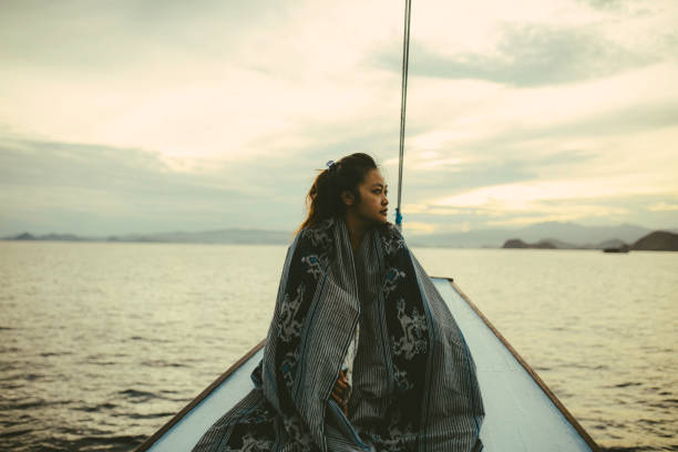 istock asian adult enjoy vacation using ship 1356501603