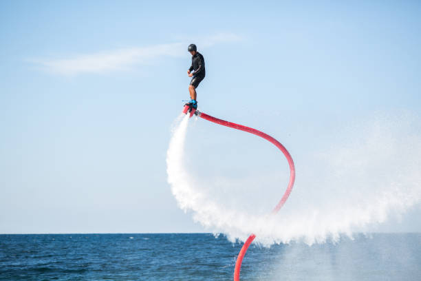 istock Silhouette of a fly board rider at sea 1356509909