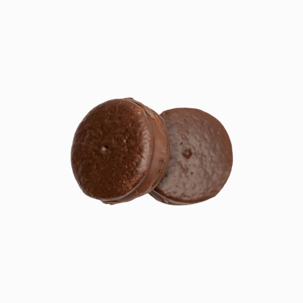 istock Chocolate-coated cookies isolated on a white background. Top view. 1356512961