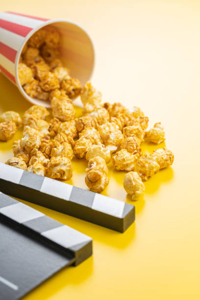 istock Sweet caramel popcorn and clapper board 1356518474