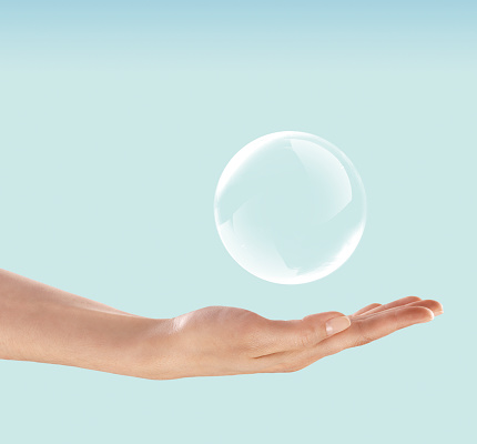 Woman holding a bubble