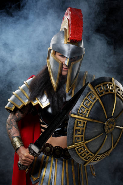 istock A senior female Warrior Gladiator holding a weapon 1356522626