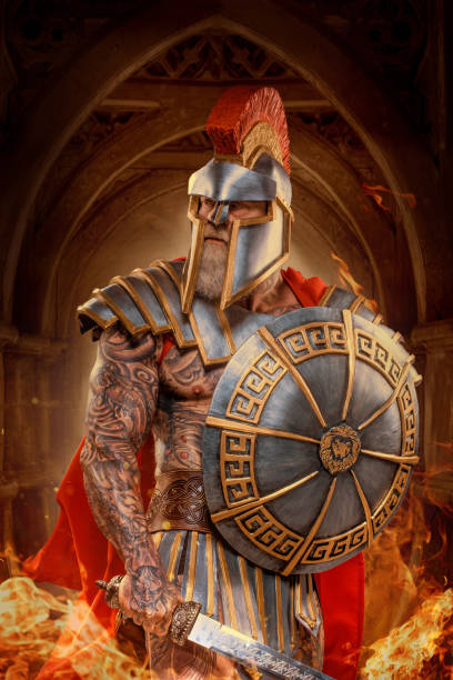 istock A senior bearded Warrior Gladiator holding a fiery weapon 1356522741