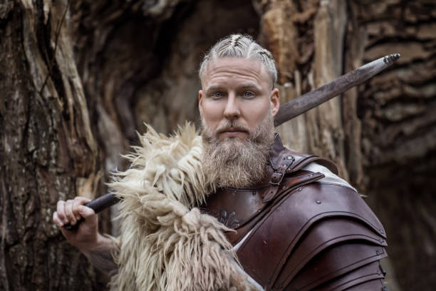 istock Russian viking warrior king in a forest 1356523043