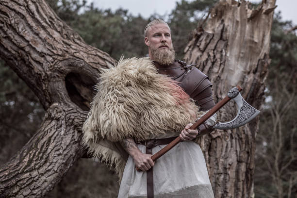 istock Russian viking warrior king in a forest 1356523090