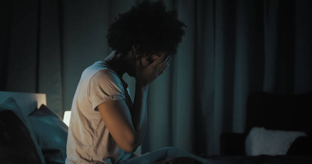 istock Depressed woman suffering from insomnia 1356523206