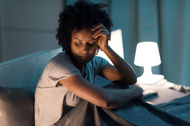 istock Young stressed woman suffering from insomnia 1356523255