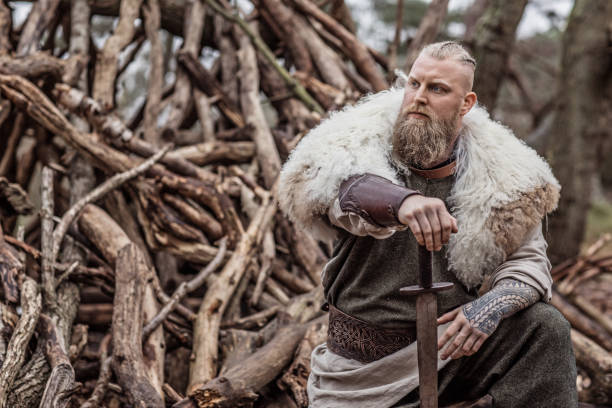 istock Viking warrior king in a forest 1356523327