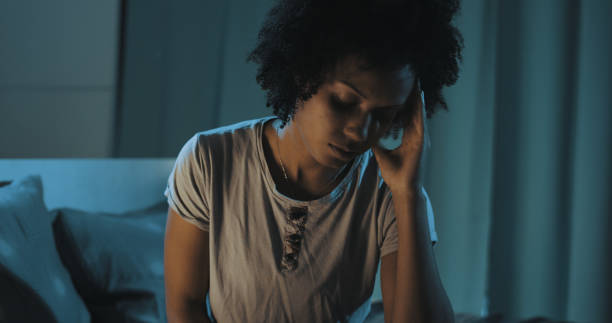 istock Depressed woman suffering from insomnia 1356524263