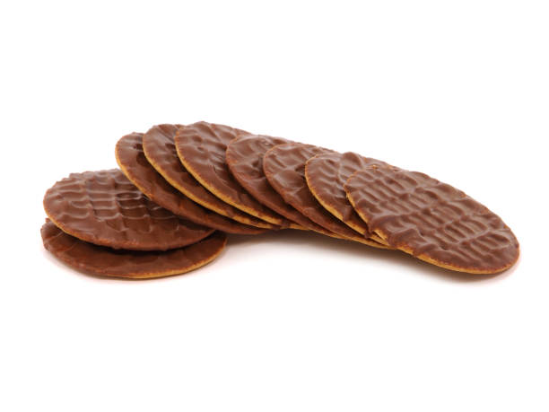 istock Biscuits covered in milk chocolate isolated on white 1356524297