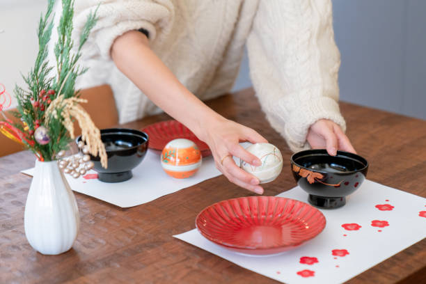 Setting the dinner table for Japanese new year celebrations. Okayama, Japan