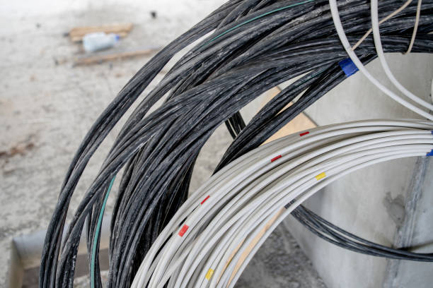 istock Interior construction site. Cabling and wiring of new office place 1356525965