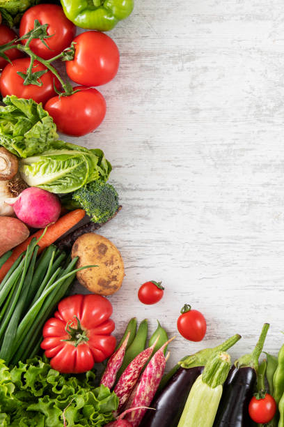 istock Fresh Vegetables on White Wooden Table 1356528033