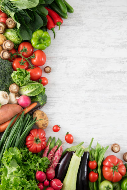 istock Fresh Vegetables on White Wooden Table 1356528173