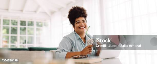Woman Taking Break While Working From Home Stock Photo - Download Image Now - Women, One Woman Only, People