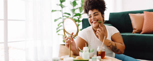 istock Woman doing beauty care routine 1356528540