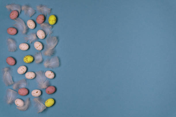 istock Yellow, white and pink chocolate eggs for Easter celebration. 1356530724