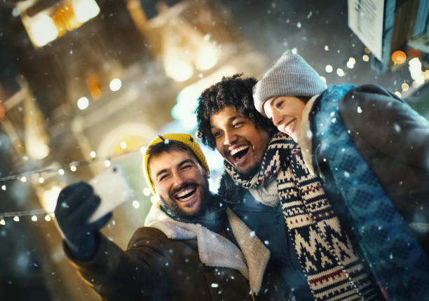 istock Friends taking a break during Christmas eve shopping. 1356531937