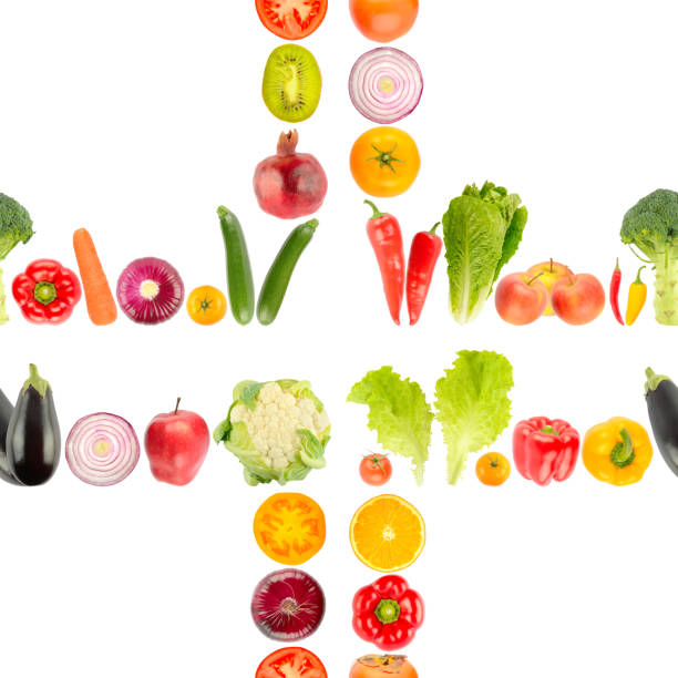 Seamless pattern from large number of bright vegetables and fruits isolated on white background.