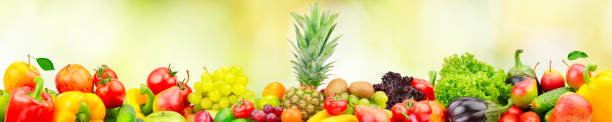 istock Fresh fruits and vegetables with large pineapple 1356537665
