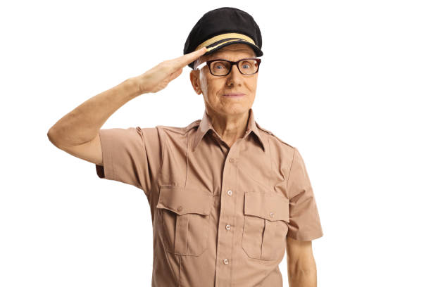 istock Elderly military officer saluting 1356538661